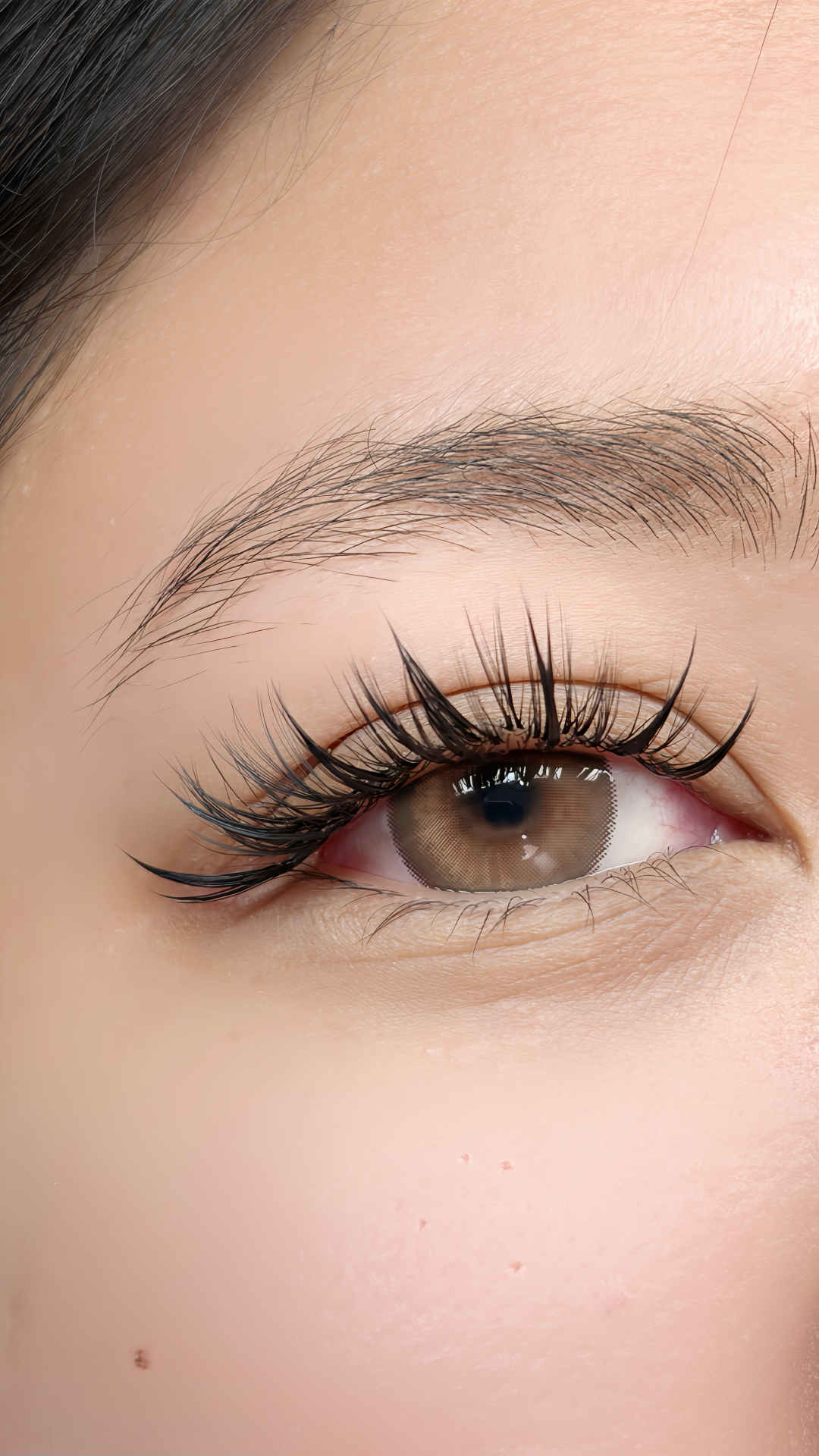 Dramatic wispy volume lash extensions close-up